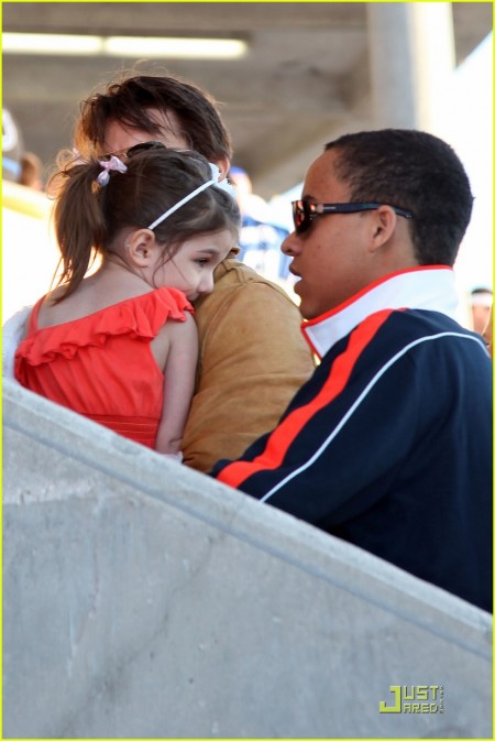 Actor Tom Cruise, daughter Suri Cruise and son Connor Cruise attend Super Bowl XLIV at the Sun Life Stadium on February 7, 2010 in Miami Gardens, Florida.